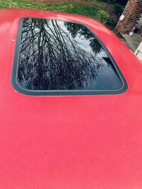 1969 red/white Ford F-250 Standard Cab Pickup