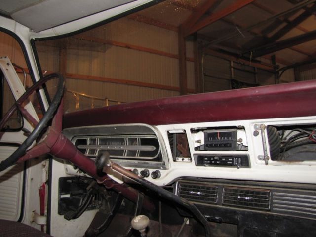 1969 red and white Ford F-250 pickup