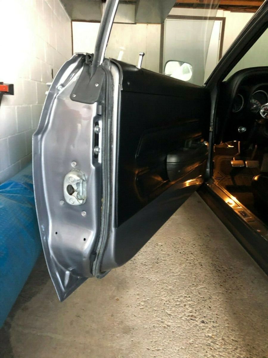 1969 metallic flake gunmetal/grey Ford Mustang Fastback