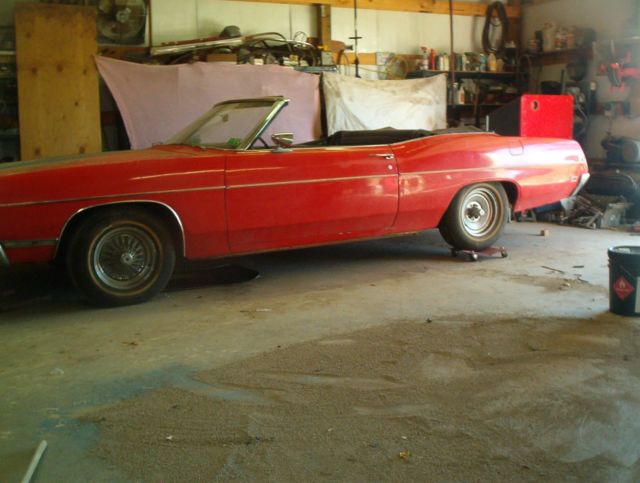 1969 red Ford ltd Convertible
