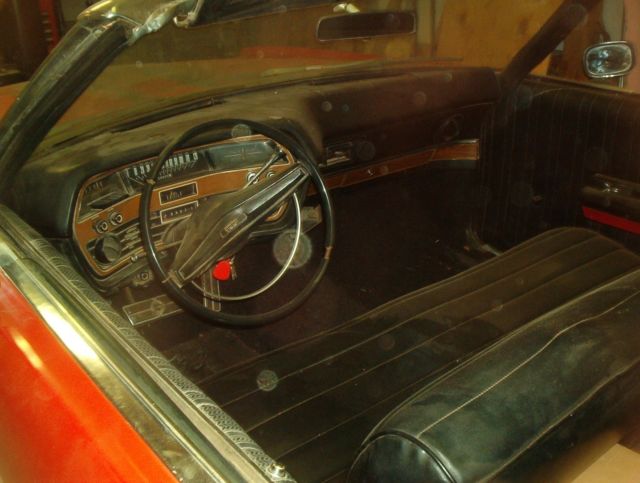 1969 red Ford ltd Convertible