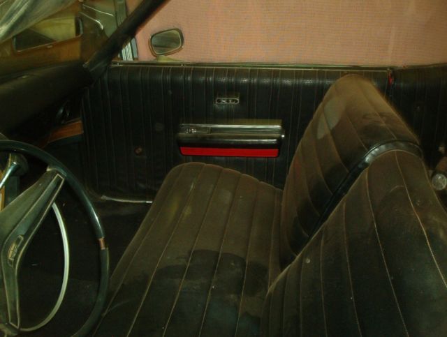 1969 red Ford ltd Convertible