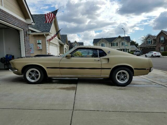 1969 Gold Ford Mustang Fastback
