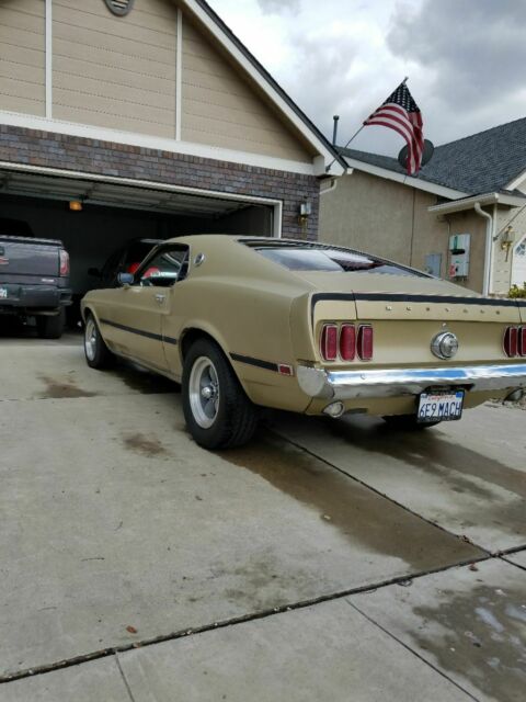 1969 Gold Ford Mustang Fastback
