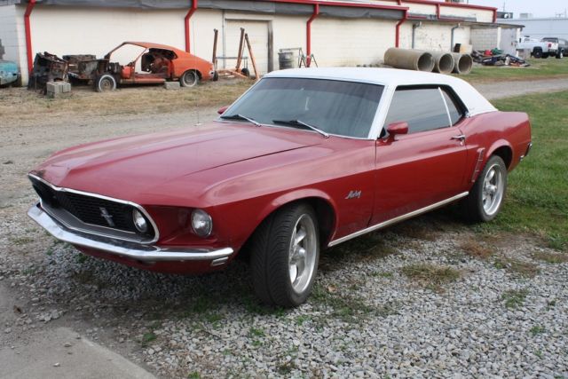 1969 Red w/White Vinyl Top Ford Mustang