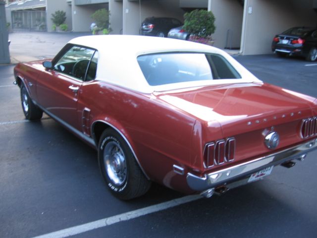1969 Burgundy Ford Mustang Coupe