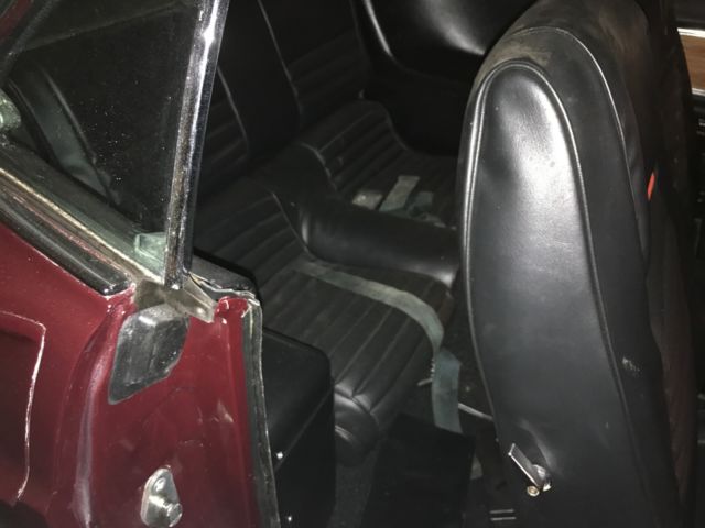 1969 Maroon Ford Mustang Fastback