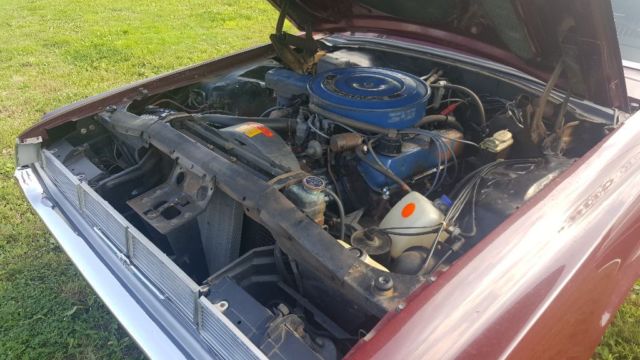 1969 Maroon w White landaeu top Ford Thunderbird