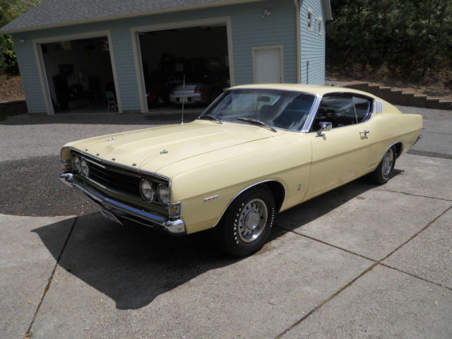 1969 maroon Ford Torino