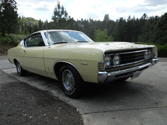 1969 maroon Ford Torino