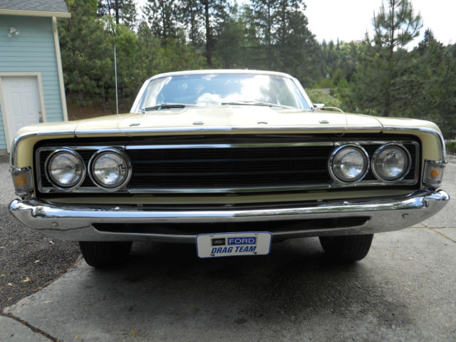 1969 maroon Ford Torino