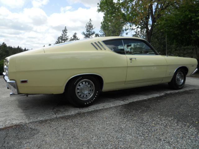 1969 maroon Ford Torino