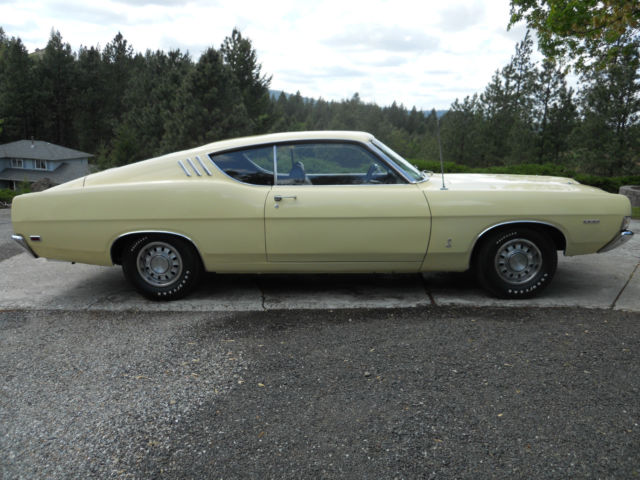 1969 maroon Ford Torino