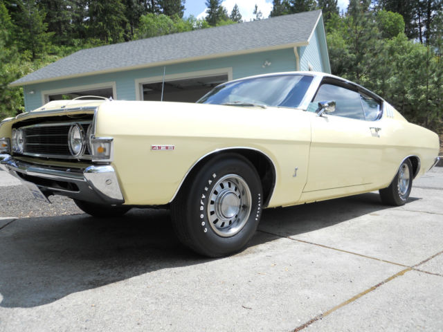 1969 maroon Ford Torino