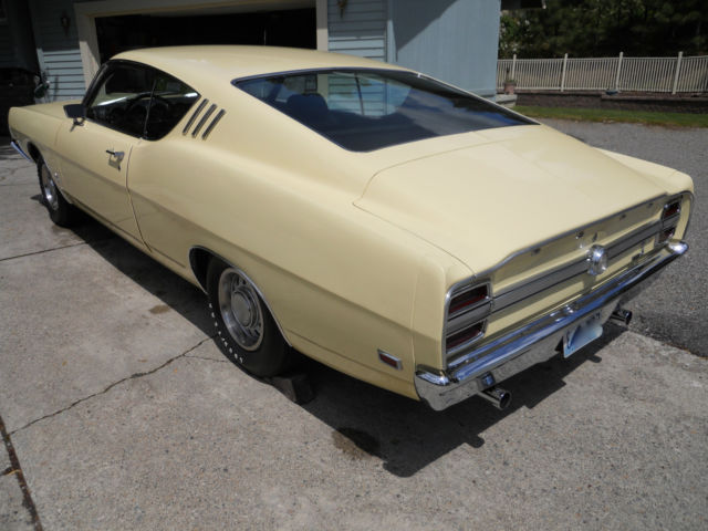 1969 maroon Ford Torino