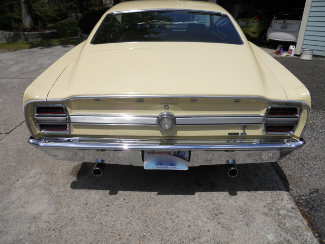 1969 maroon Ford Torino