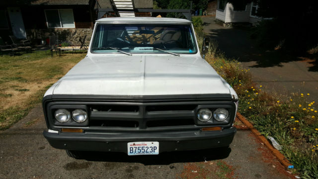 1969 white GMC pickup bed with side boxes