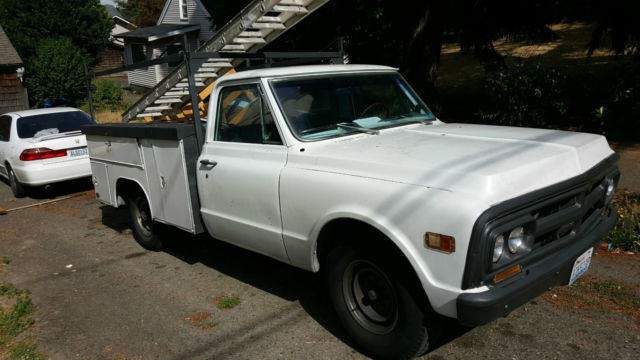 1969 white GMC pickup bed with side boxes