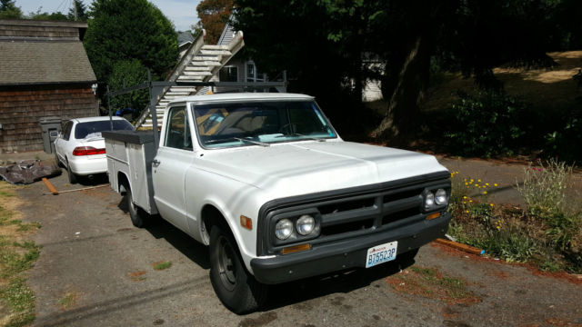 1969 white GMC pickup bed with side boxes