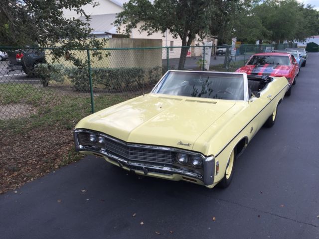 1969 cream yellow Chevrolet Impala Convertible