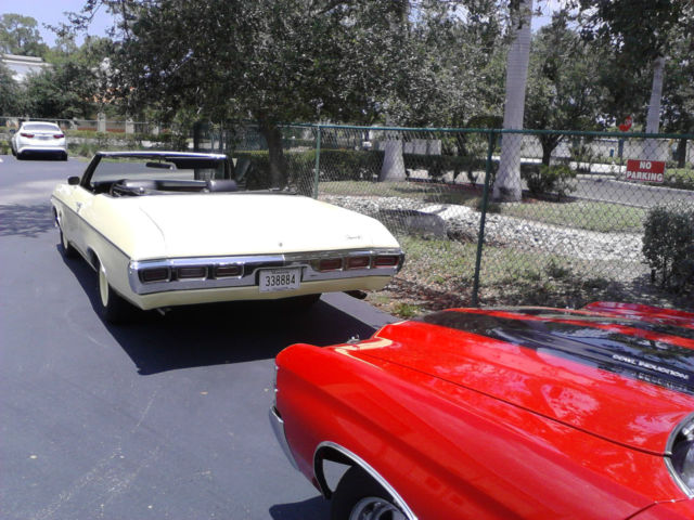 1969 cream yellow Chevrolet Impala Convertible