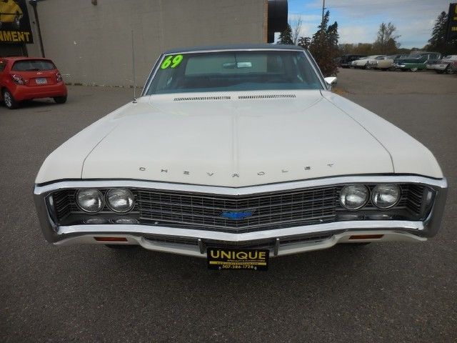 1969 White Chevrolet Impala Coupe