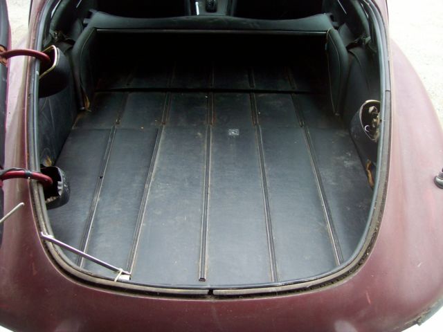 1969 Burgundy Jaguar E-Type Coupe