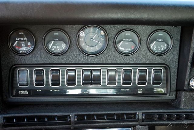 1969 Burgundy Jaguar E-Type Coupe