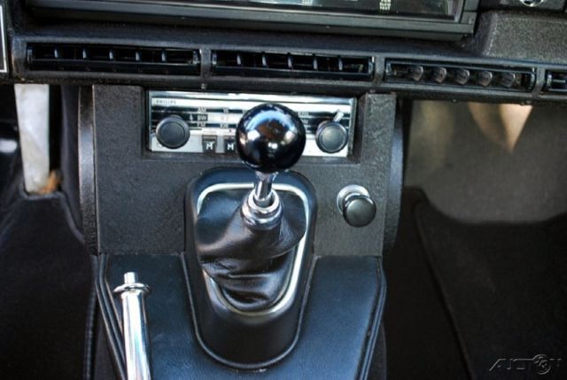 1969 Burgundy Jaguar E-Type Coupe