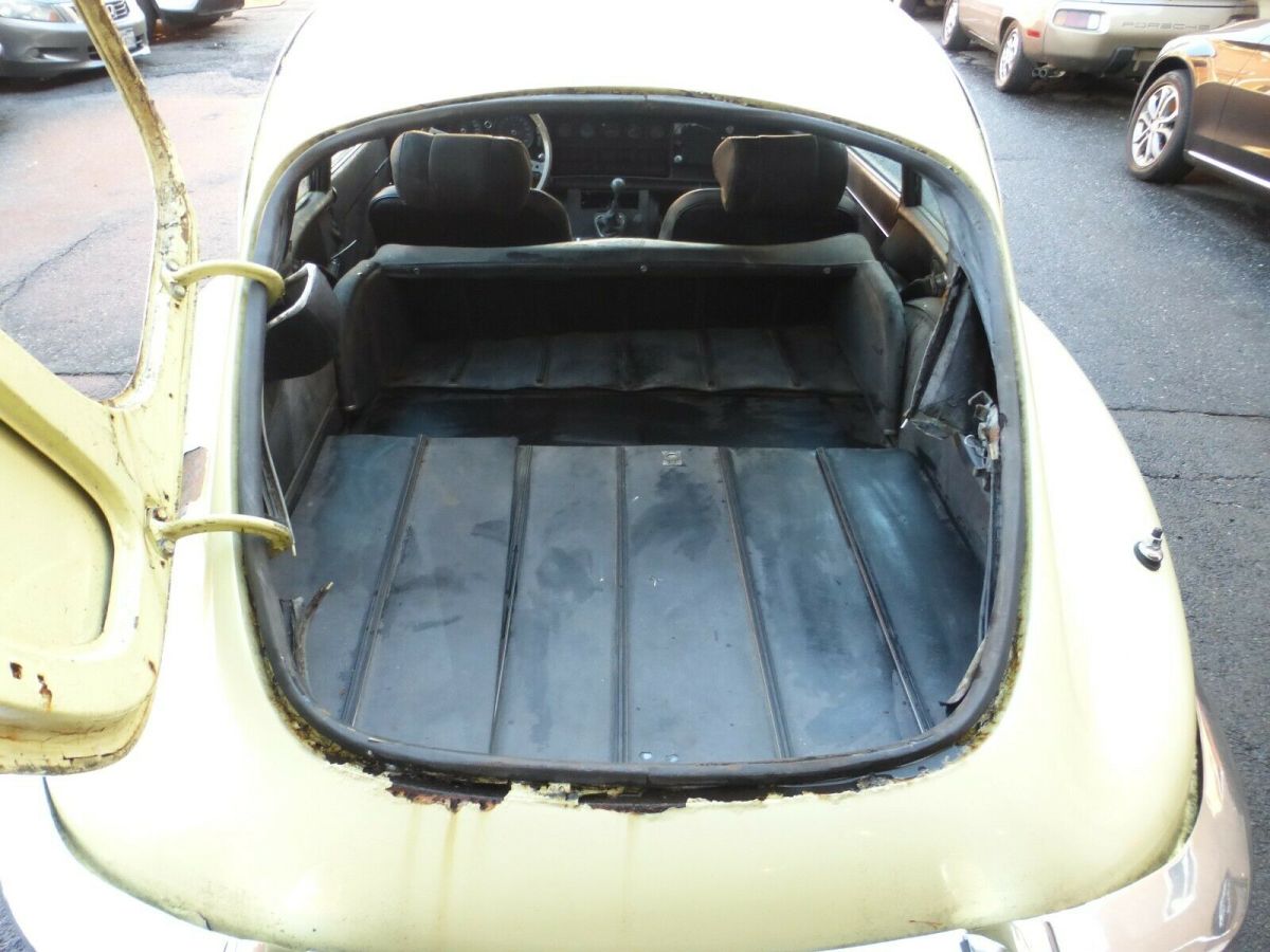 1969 Yellow Jaguar XK Coupe