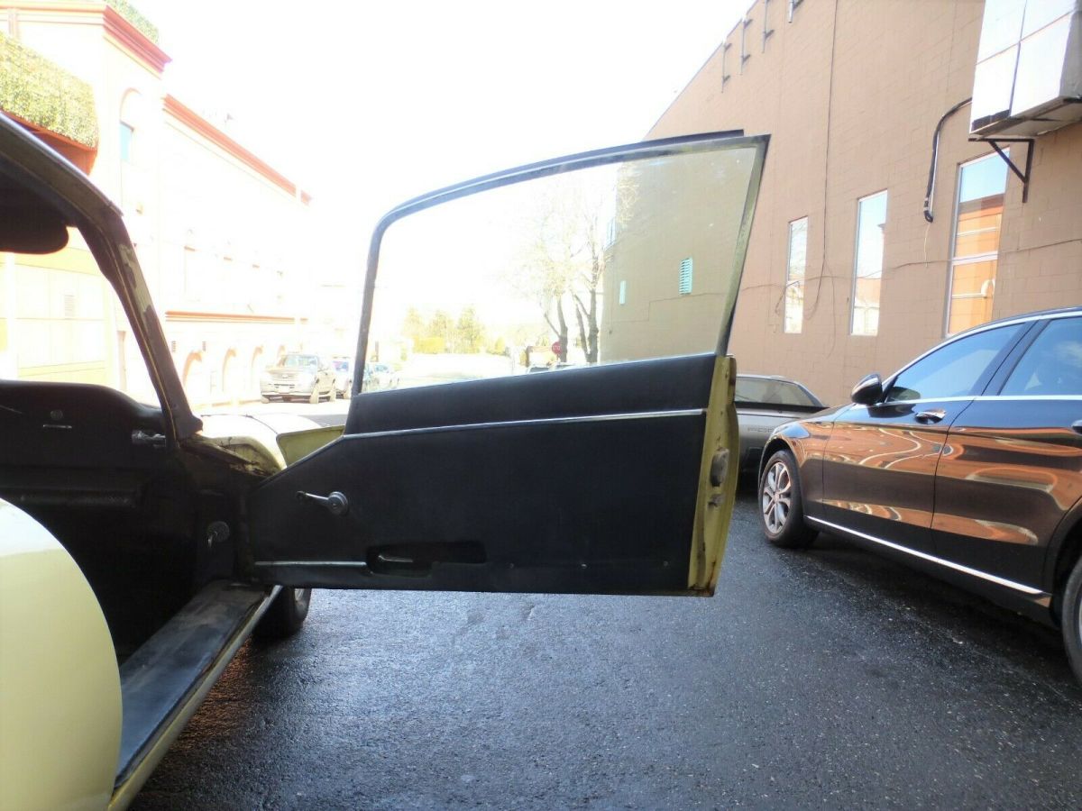 1969 Yellow Jaguar XK Coupe