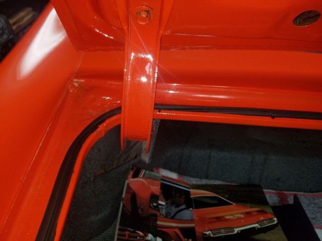 1969 carasile red .hugger orange Pontiac GTO Coupe