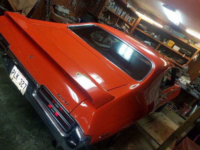 1969 carasile red .hugger orange Pontiac GTO Coupe
