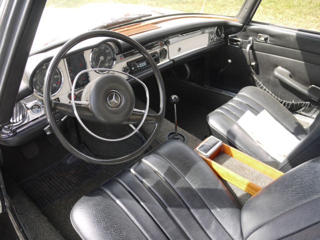 1969 White Mercedes-Benz SL-Class Convertible