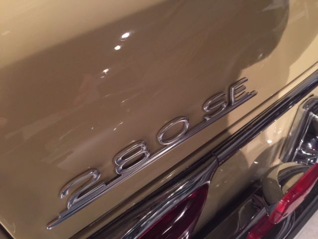 1969 Yellow Mercedes-Benz 200-Series Coupe