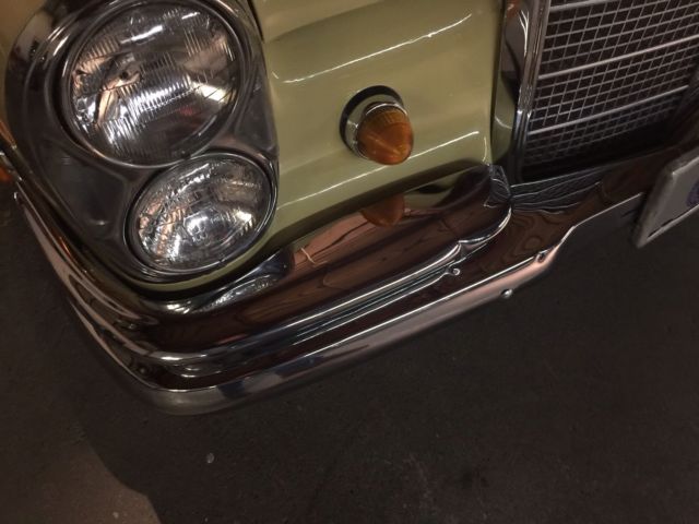 1969 Yellow Mercedes-Benz 200-Series Coupe