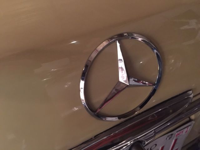 1969 Yellow Mercedes-Benz 200-Series Coupe