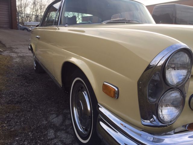 1969 Yellow Mercedes-Benz 200-Series Coupe