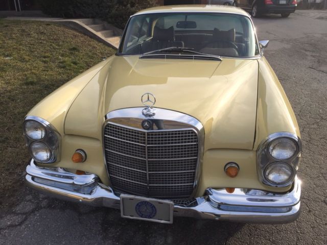 1969 Yellow Mercedes-Benz 200-Series Coupe