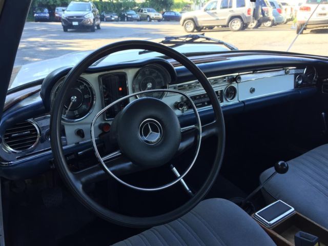 1969 White Mercedes-Benz SL-Class Convertible