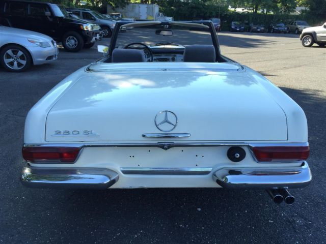 1969 White Mercedes-Benz SL-Class Convertible