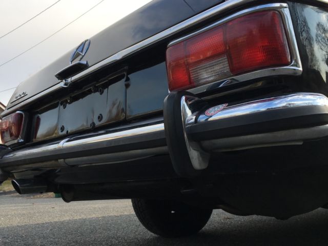 1969 Black Mercedes-Benz 200-Series Sedan