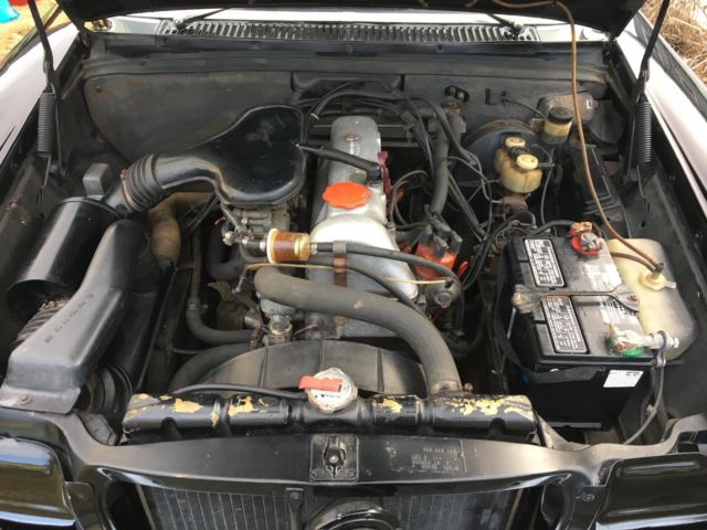 1969 Black Mercedes-Benz 200-Series Sedan