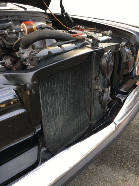 1969 Black Mercedes-Benz 200-Series Sedan