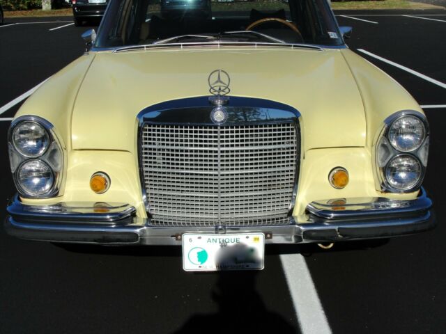 1969 Yellow Mercedes-Benz 200-Series Sedan