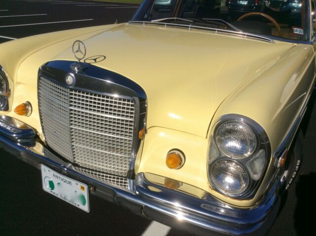 1969 Yellow Mercedes-Benz 200-Series Sedan
