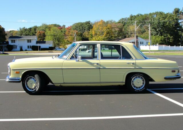 1969 Yellow Mercedes-Benz 200-Series Sedan