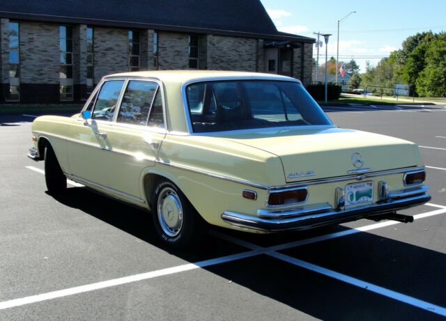 1969 Yellow Mercedes-Benz 200-Series Sedan