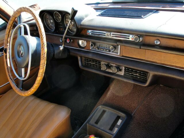 1969 Yellow Mercedes-Benz 200-Series Sedan