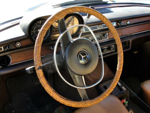 1969 Yellow Mercedes-Benz 200-Series Sedan